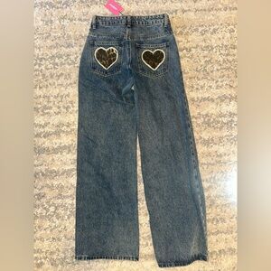 Edikted Womens blue wash jeans with leaped heart design. Low rise size xs